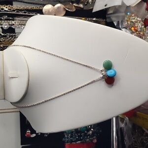 Jade, turquoise and carnelian. On a sterling chain.